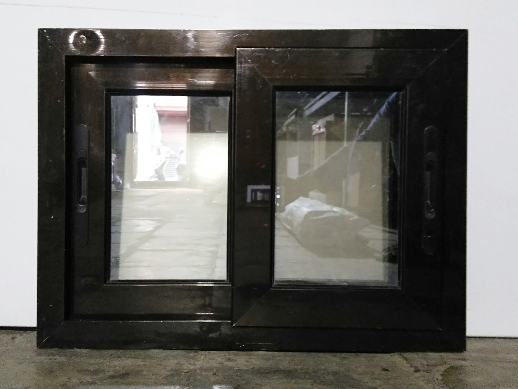 Aluminium Domal Sliding window surat